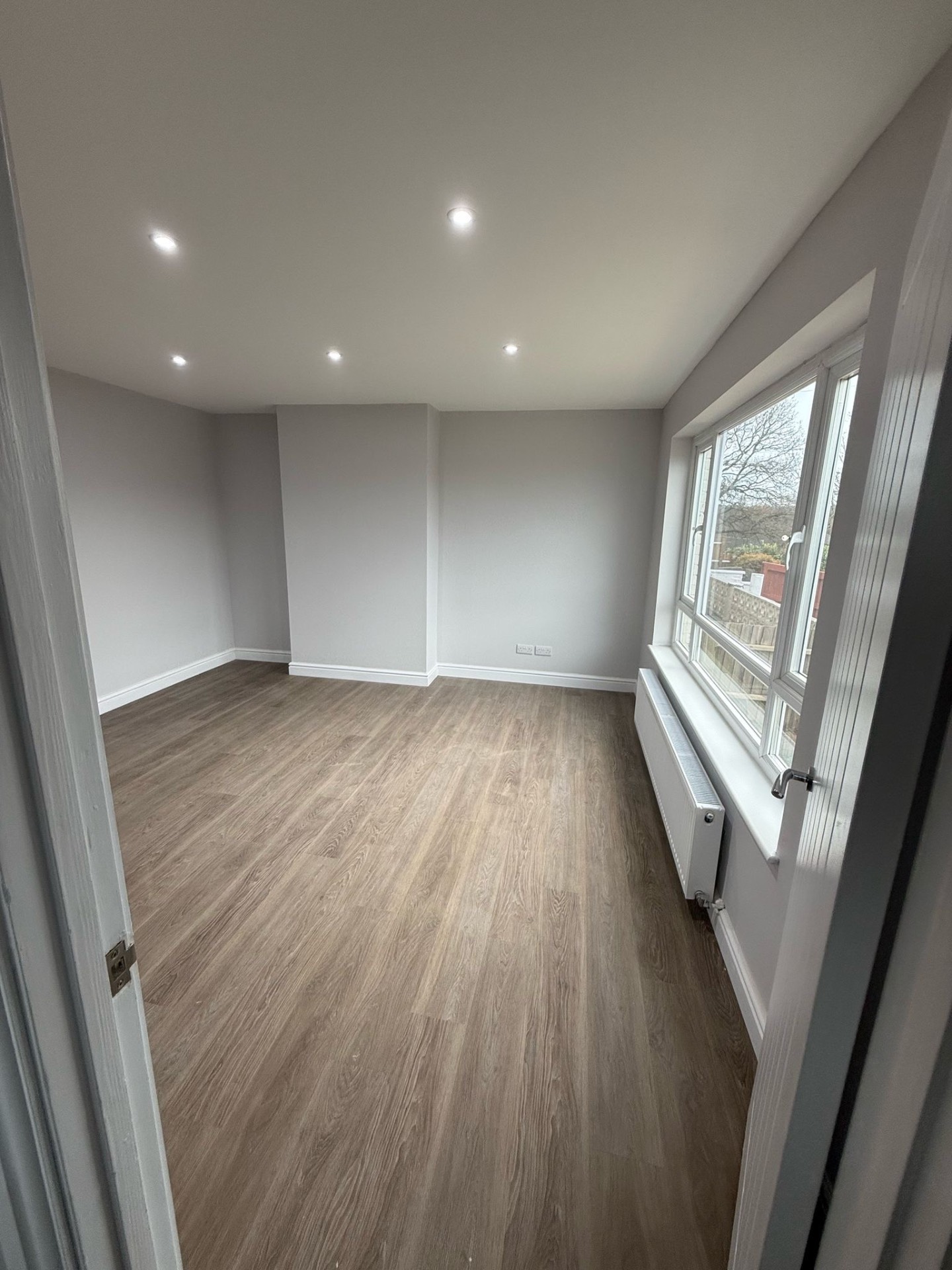 Second bedroom with new ceiling downlights after a full rewire